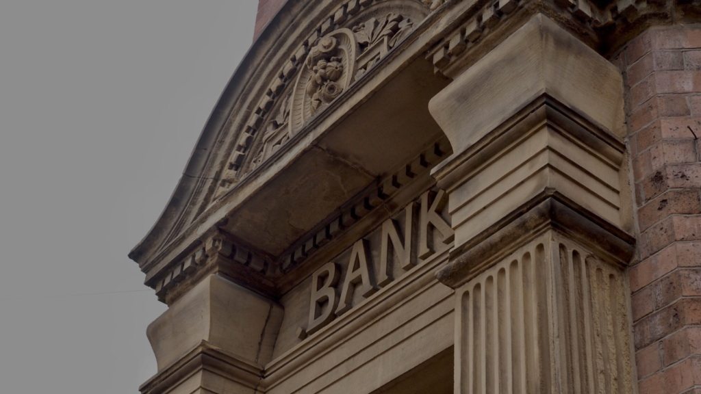 Photo of an old bank with large ornamental columns