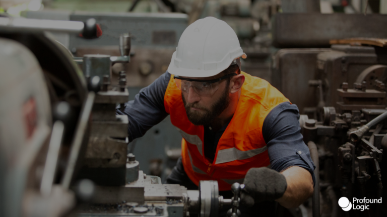 a person working on a machine in a factory